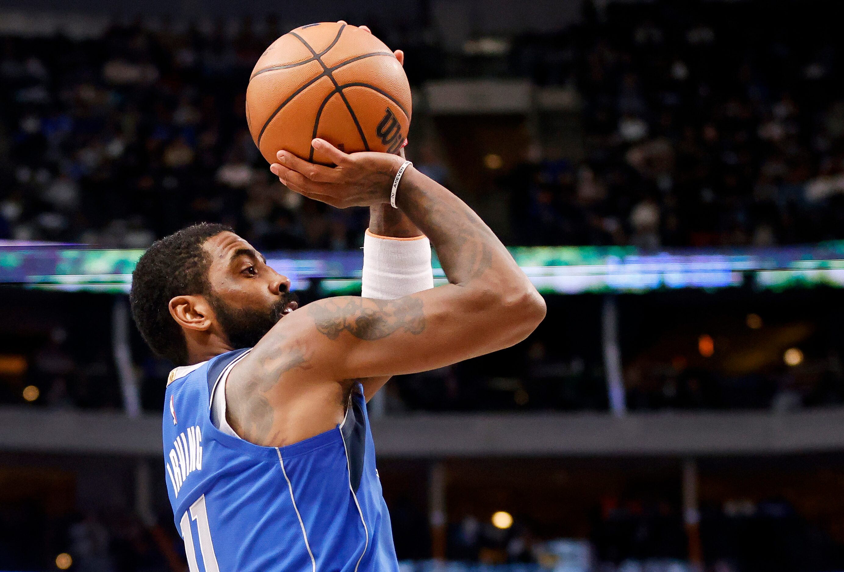 Dallas Mavericks guard Kyrie Irving (11) takes a first half shot against the New Orleans...