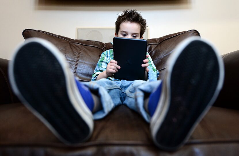 Limiting screen time is one way author Katherine Reynolds Lewis suggests parents can...