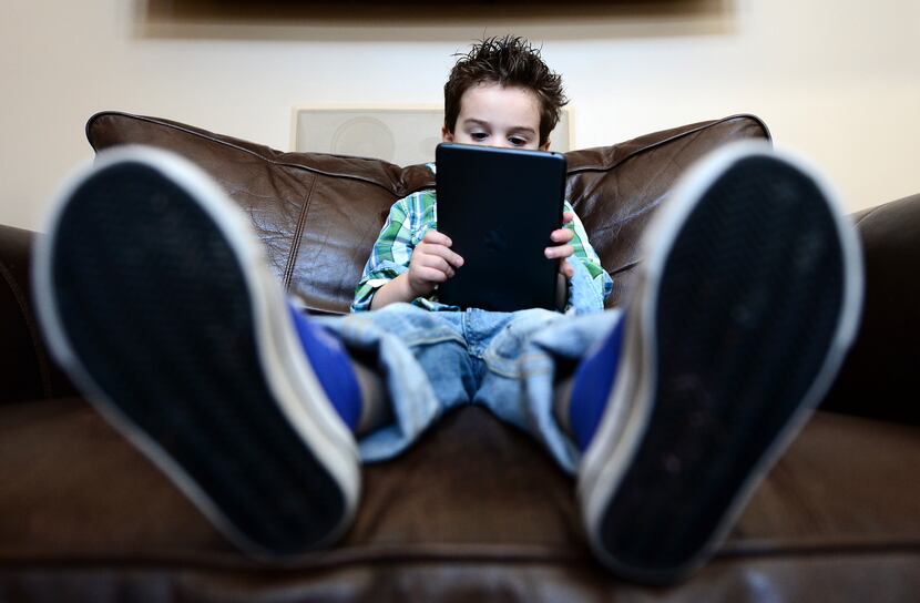 Limiting screen time is one way author Katherine Reynolds Lewis suggests parents can...