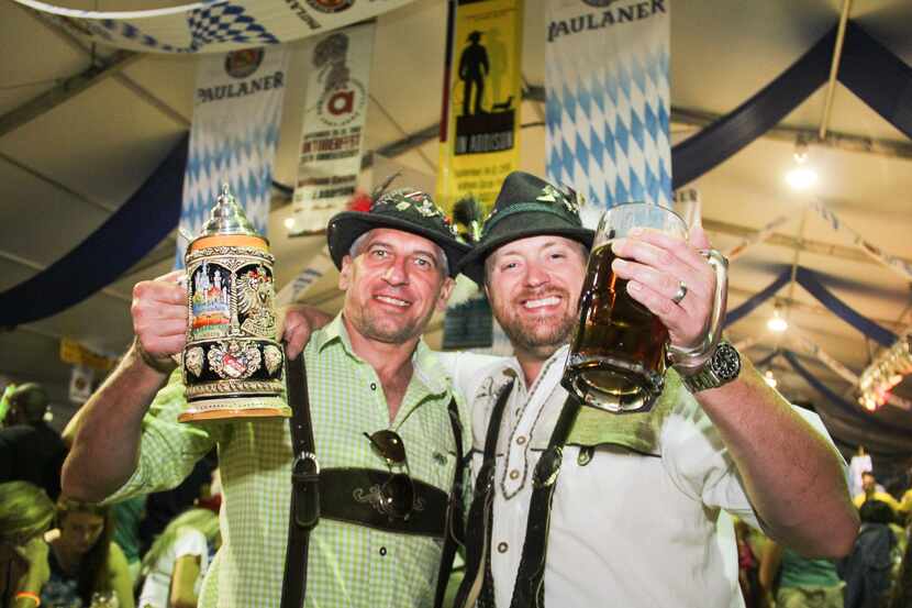 Antomio Cchirca and Paul Grein enjoyed the beer at Oktoberfest in Addison last year. The...