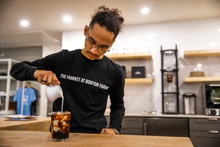 Barista James Villa prepares a cold brew coffee at The Coffee Shop at Bonton Farms.