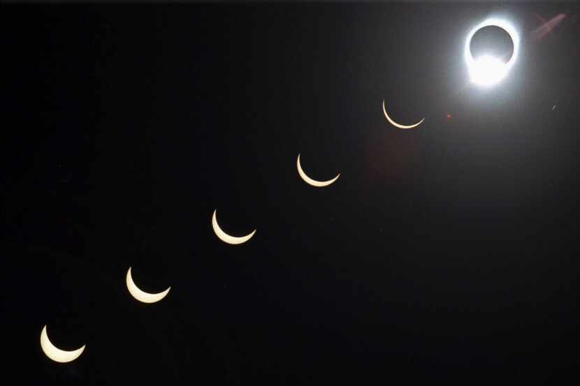 FILE - The progression of a total solar eclipse is seen in a multiple exposure photograph...
