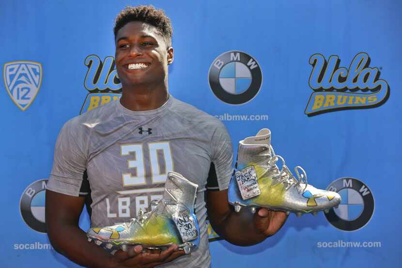 UCLA linebacker Myles Jack poses with his self-designed "Jack of all Trades" shoes at NLF...