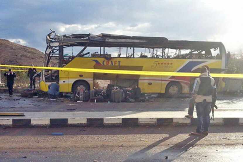 Luggage was pulled from a tourist bus that was destroyed by a bomb placed  under the...