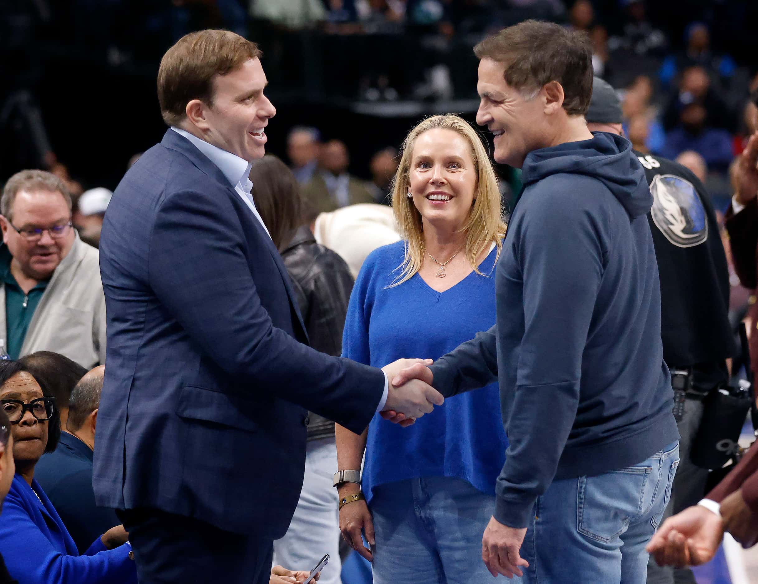 Dallas Mavericks new governor and majority owner Patrick Dumont (left) shakes hands with...