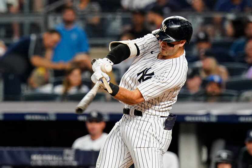 New York Yankees' Joey Gallo breaks his bat as he flies out during the second inning of the...
