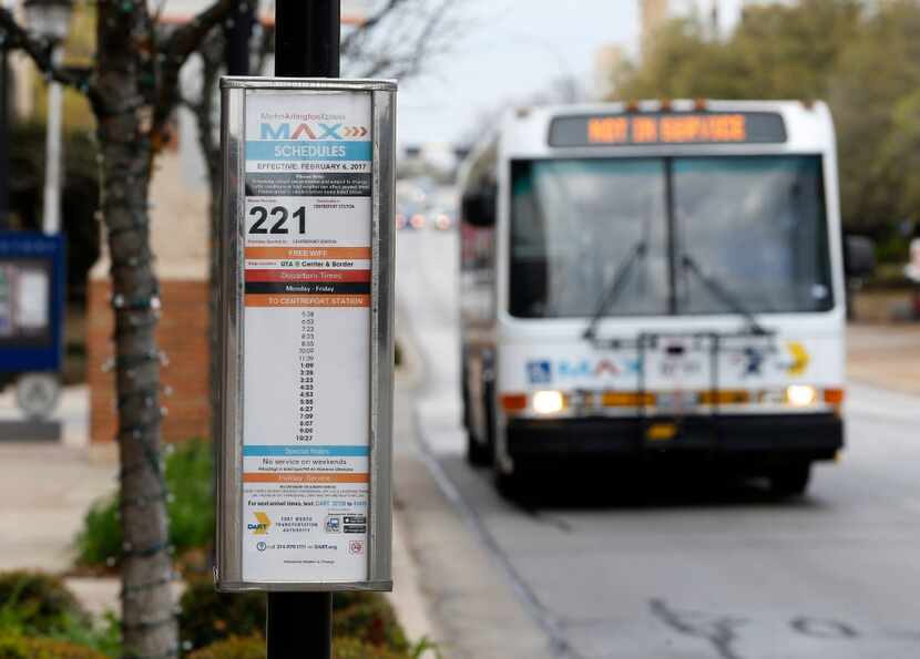 An Arlington MAX bus stops at College Park on the campus of the University of Texas at...