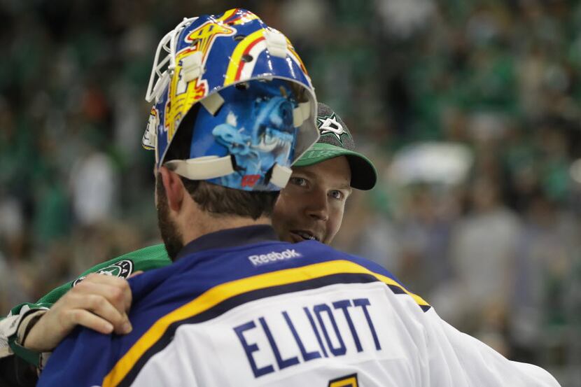 DALLAS, TX - MAY 11:  Brian Elliott #1 of the St. Louis Blues shakes hands with Kari...