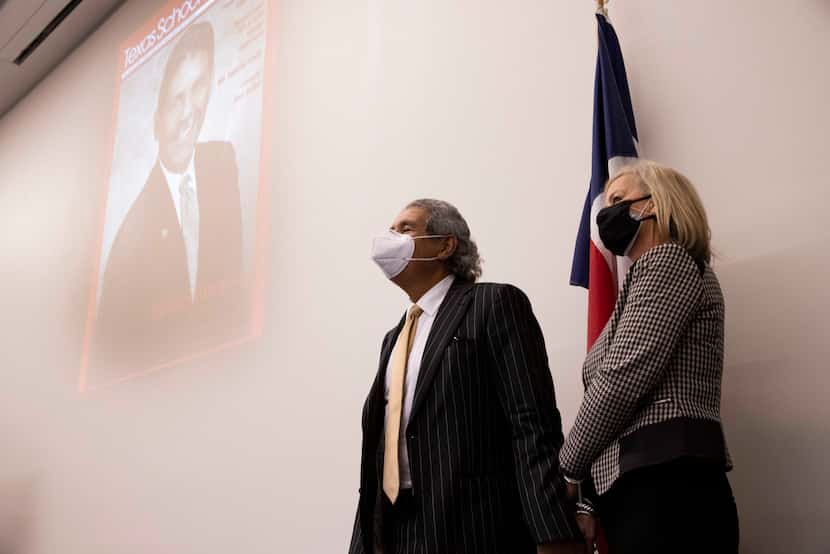 Dallas ISD superintendent Michael Hinojosa (left) holds his wife Kitty's hand as they watch...