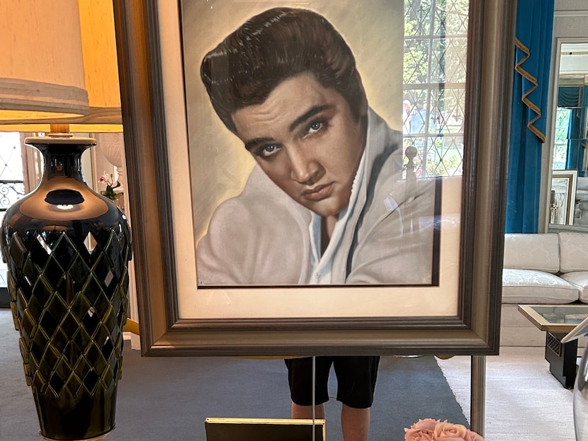 This portrait of Elvis is one of many decorating Graceland in Memphis. In 2024 someone,...