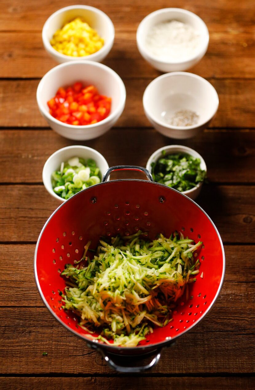 Zucchini fritters are prepared before frying.