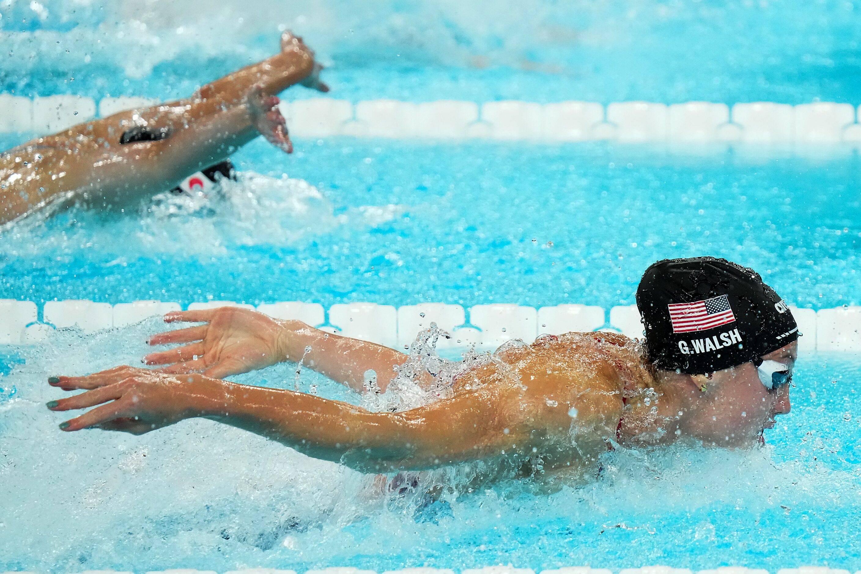 Gretchen Walsh of the United States competes in the women's 100-meter butterfly semifinal at...