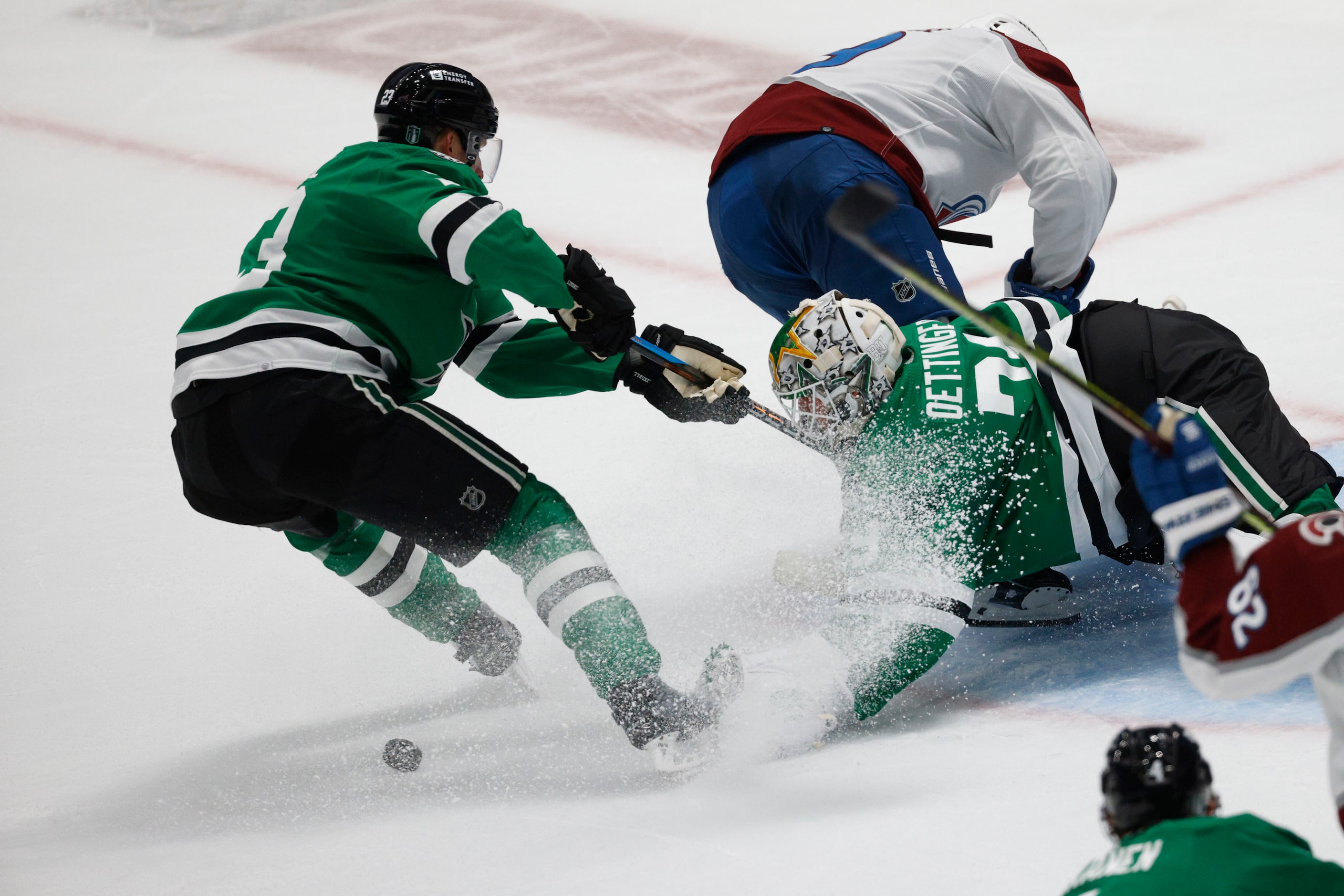 Dallas Stars goaltender Jake Oettinger (29) makes a save against Colorado Avalanche left...