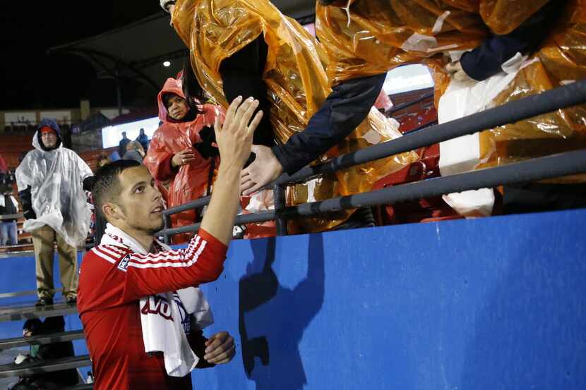 FC Dallas defender Matt Hedges (24) greets fans following the final leg of the MLS Western...