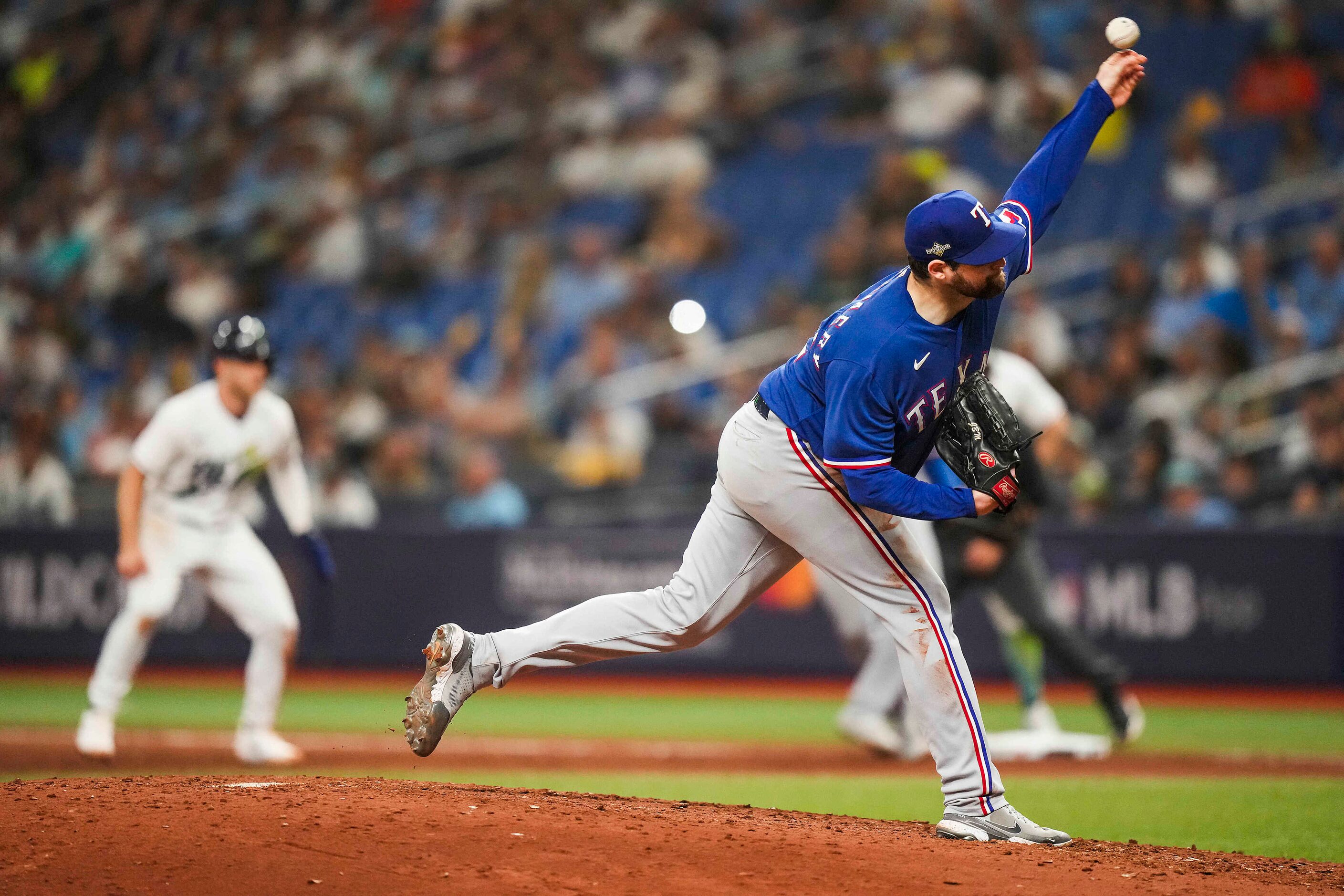 Texas Rangers starting pitcher Jordan Montgomery delivers during the seventh inning of an...