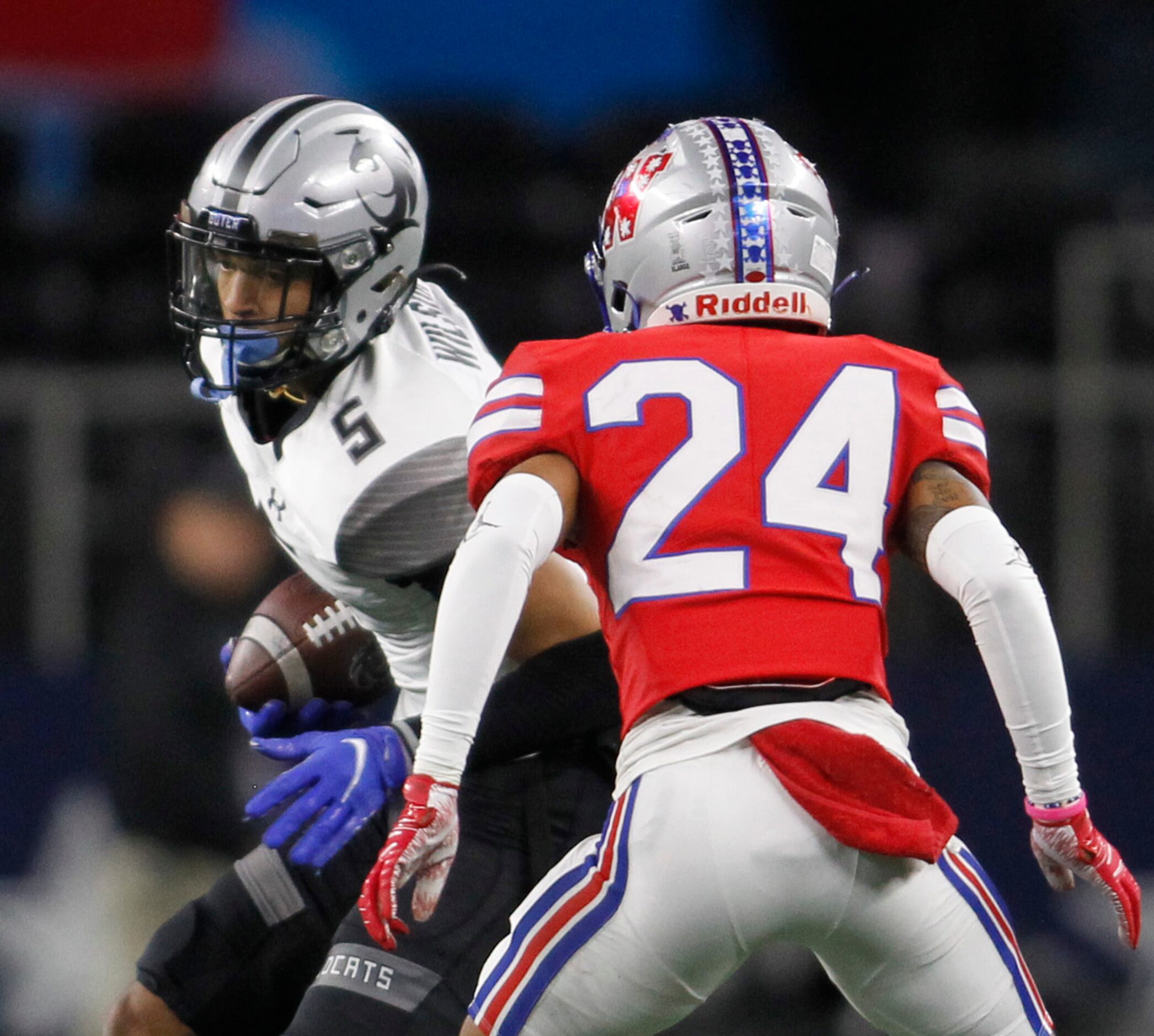 Denton Guyer receiver Jace Wilson (5), left, pulls in a pass in front of Austin Westlake...