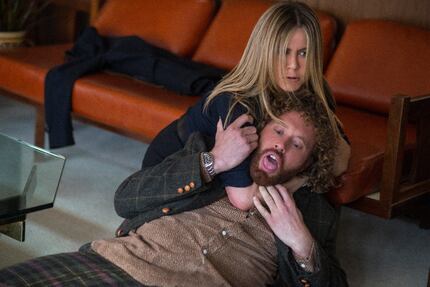 Jennifer Aniston and T.J. Miller in a scene from "Office Christmas Party."
