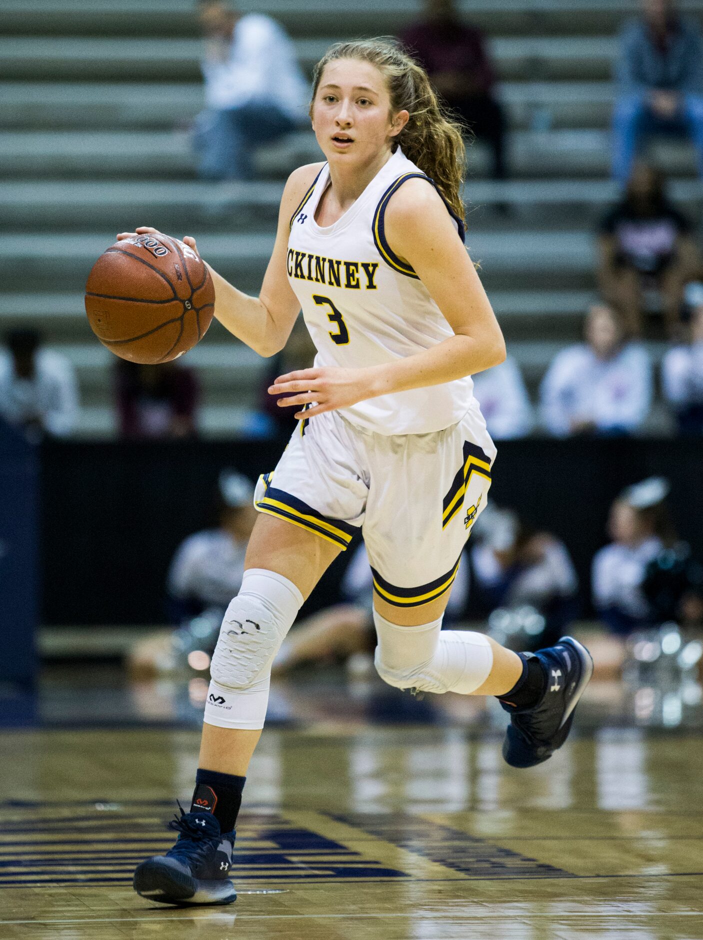 McKinney guard Taylor Bouck (3) takes the ball down the court during the second quarter of a...