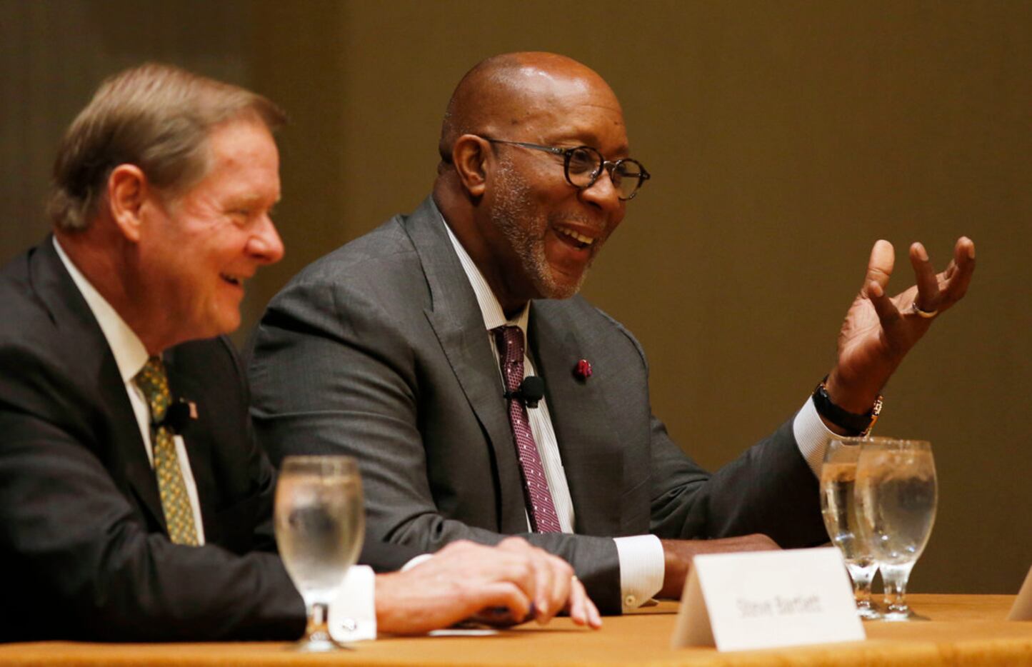 Former Dallas mayors Ron Kirk and Steve Bartlett shared a laugh during a panel held by the...