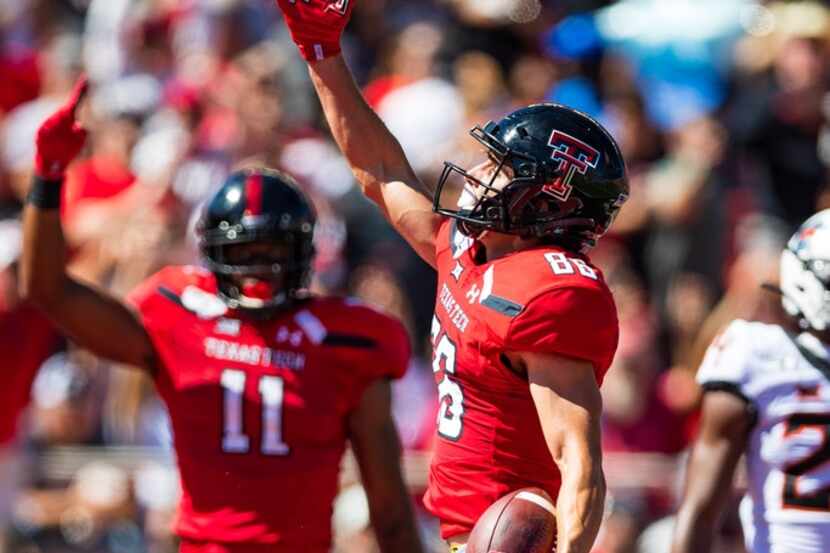 Wide receiver Dalton Rigdon #86 of the Texas Tech Red Raiders celebrates after scoring a...