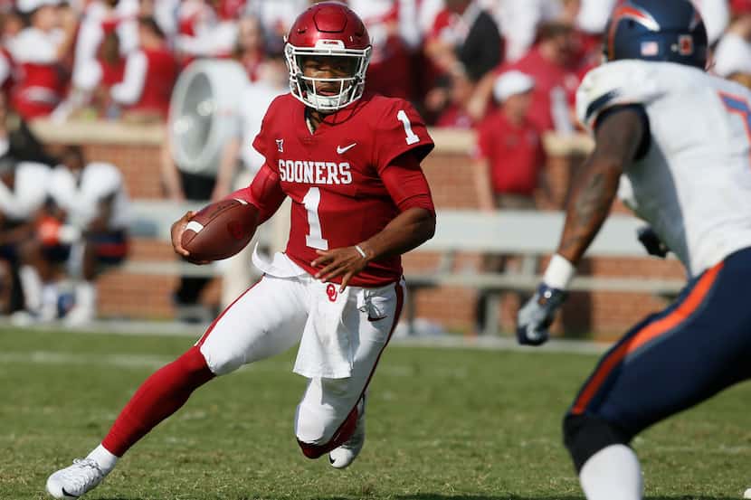 FILE - In this Sept. 2, 2017, file photo, Oklahoma quarterback Kyler Murray (1) carries...