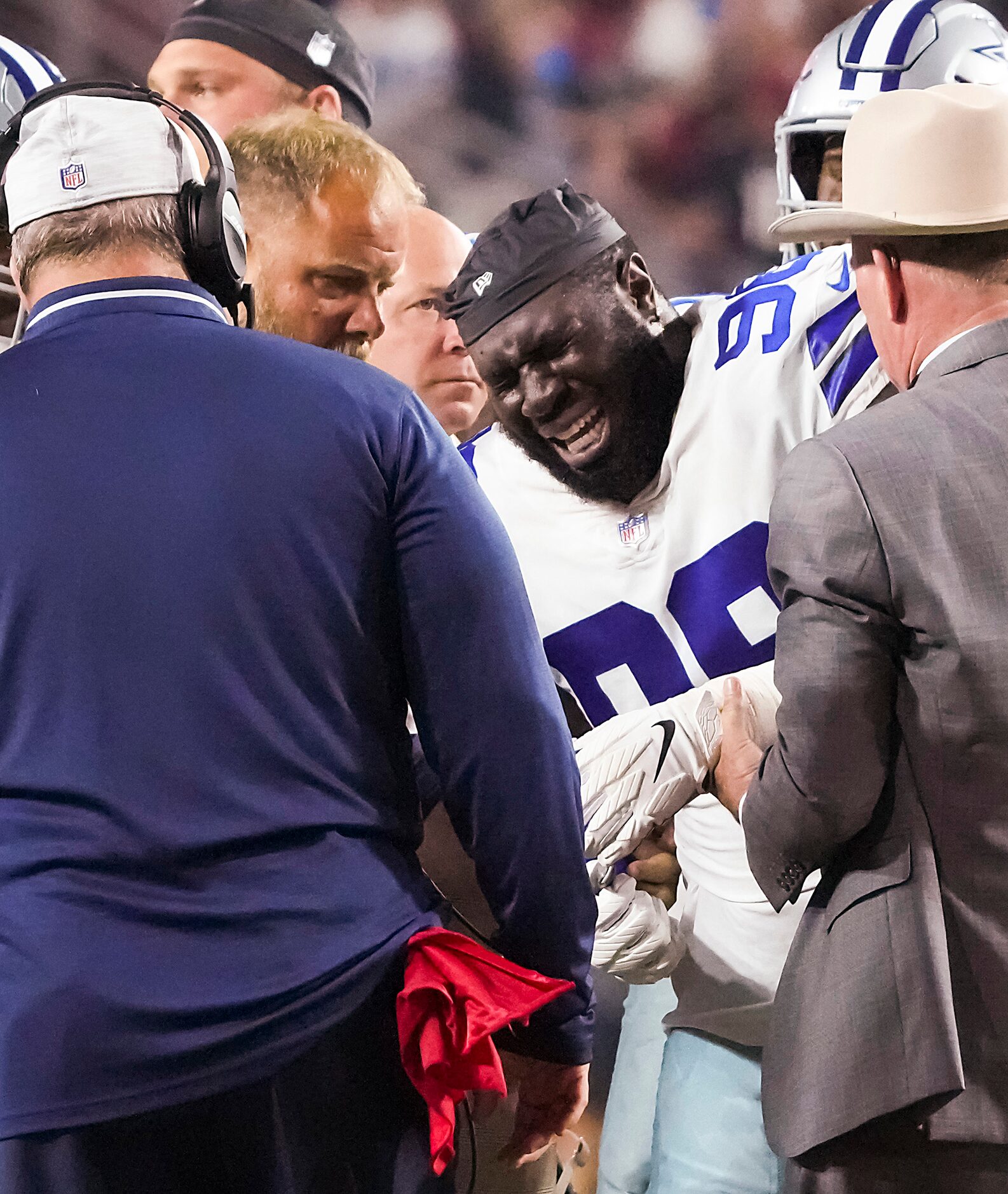 Dallas Cowboys defensive tackle Neville Gallimore (96) receives medical attention after...