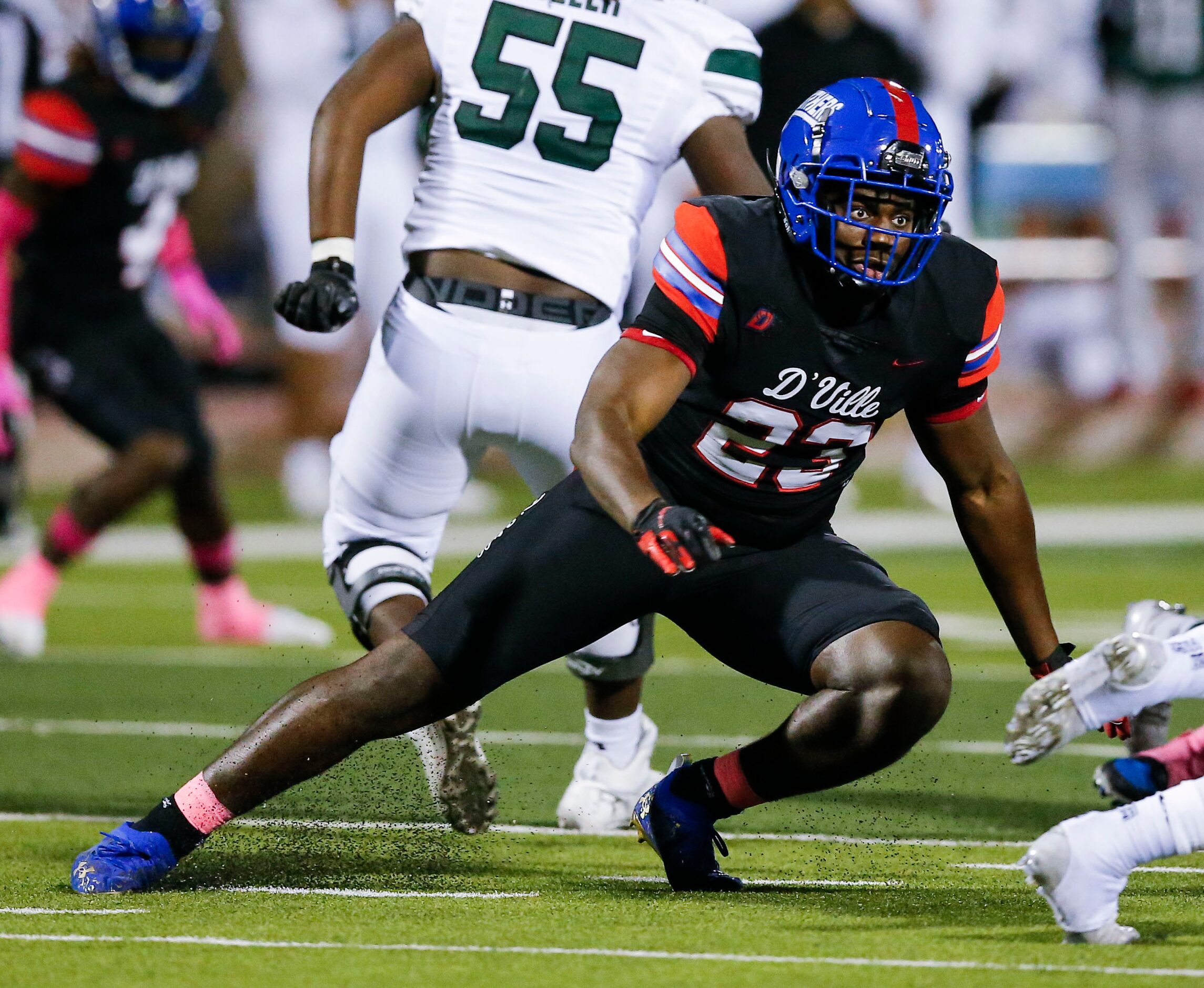 Duncanville senior defensive lineman Omari Abor (23) defends during the second half of a...