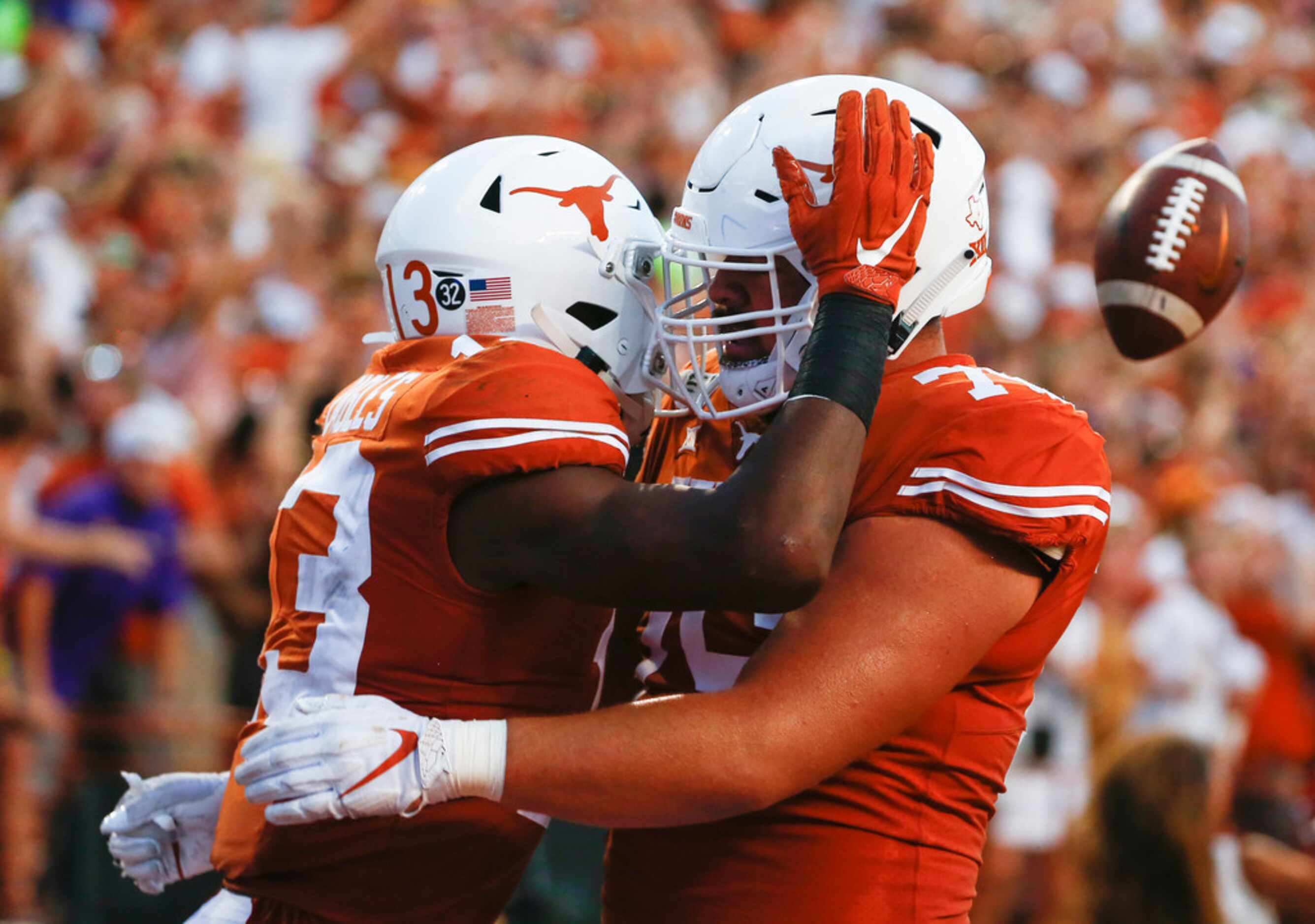 Texas Longhorns wide receiver Brennan Eagles (13) celebrates with Texas Longhorns offensive...