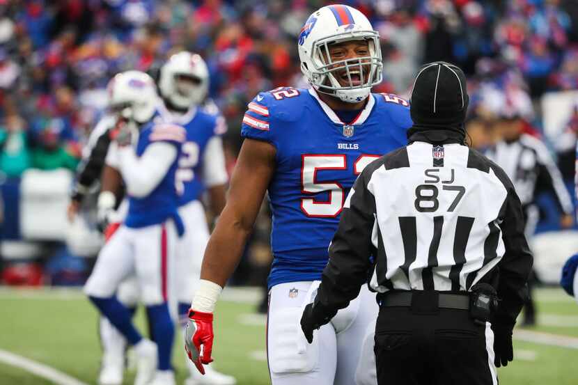 ORCHARD PARK, NY - DECEMBER 17:  Preston Brown #52 of the Buffalo Bills talks with side...