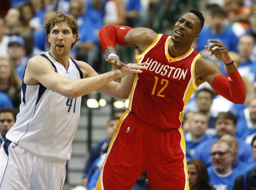 Dallas Mavericks forward Dirk Nowitzki (41) and Houston Rockets center Dwight Howard (12)...