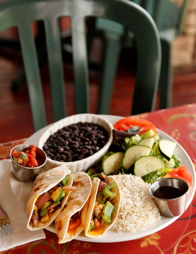 Taco Trinity at Cosmic Cafe, photographed April 26, 2012. Cosmic Cafe, located at 2912 Oak...