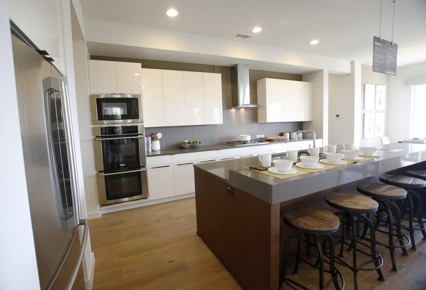 Kitchen area in the MainVue Homes Carmel Q1 model home at Phillips Creek Ranch in Frisco, on...