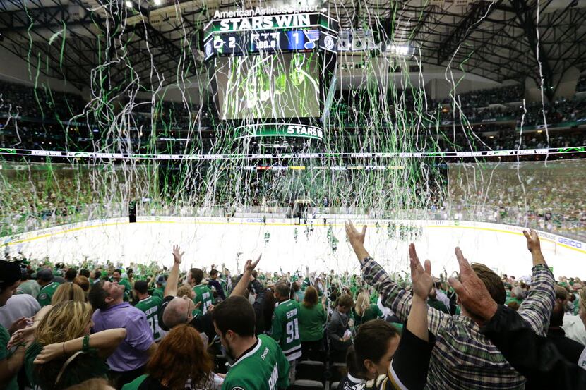 Streamers fall from the rafters as Dallas Stars fans celebrate their team's 2-1 victory over...