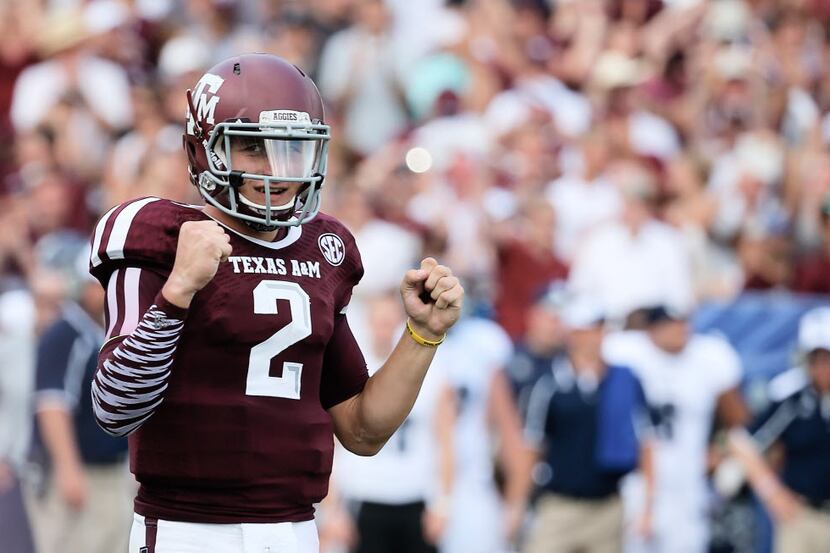 COLLEGE STATION, TX - AUGUST 31:  Johnny Manziel #2 of the Texas A&M Aggies celebrates a...