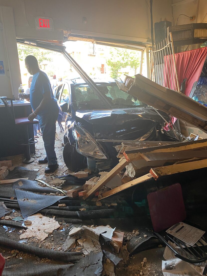 After the crash, debris fills the dining room of Black Jack Pizza in South Dallas.