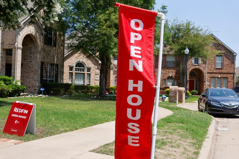 An “open house” sign is displayed outside in a neighborhood on Saturday, June 24, 2023 in...