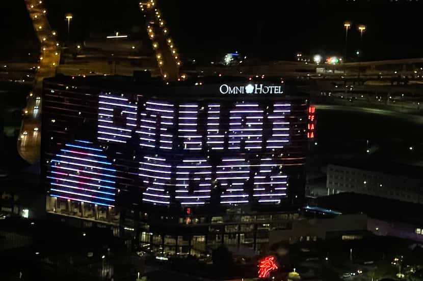 The Omni Hotel in downtown Dallas displays "Dallas 2020," in support of Dallas' bid to host...