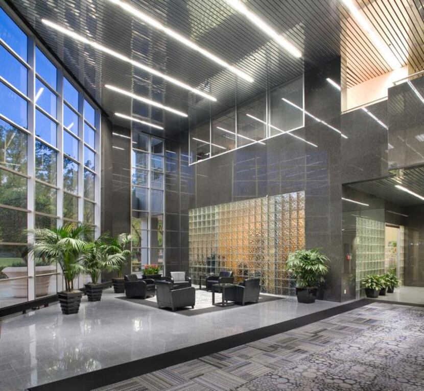 
The building’s lobby is done in dark stone as was popular in the 1980s, but that’ll change...