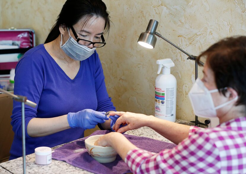 Lan Lee gave Teresa Boyer a manicure at Nailed-Nail Bar in Dallas' Oak Lawn neighborhood on...