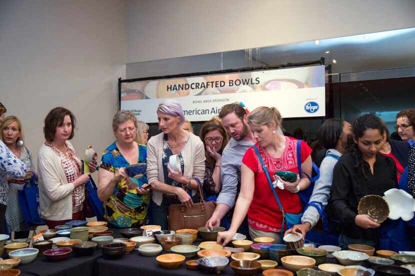 Ceramic bowls are on display for choosing during the 18th Annual Empty Bowls event at the...