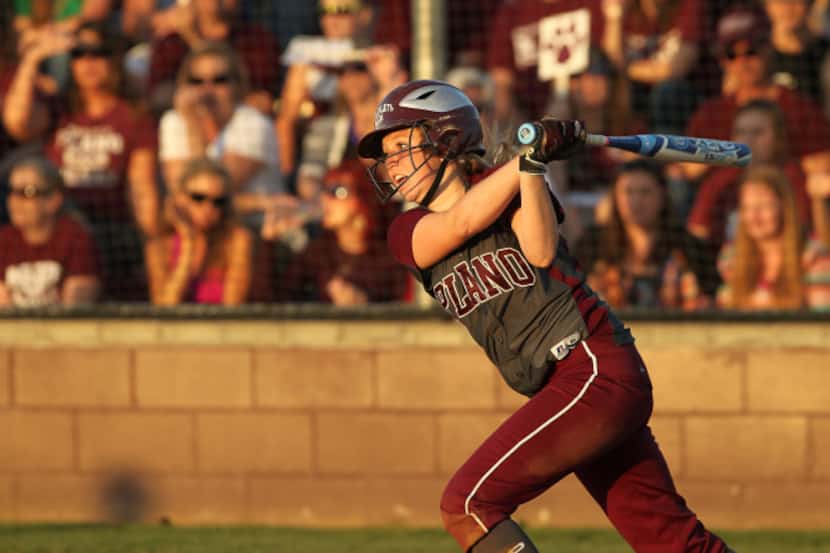 Plano Wildcats' Kali Bolter (11) follows through on a hit in the third inning of Bi-District...