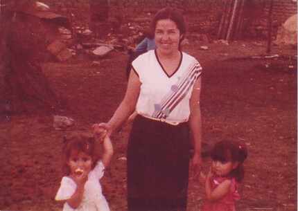 Martha Doss (left), at age 3 with her mother, Socorro Jimenez, and twin sister Erica...