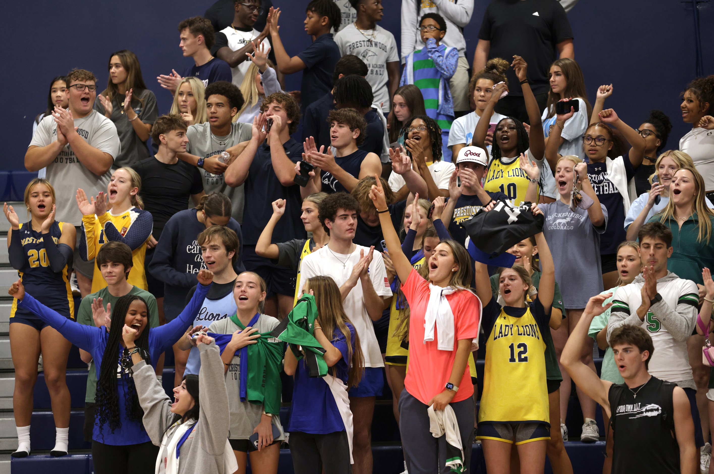 Fans cheer after Ursuline sweeps Prestonwood during the Ursuline Academy of Dallas versus...