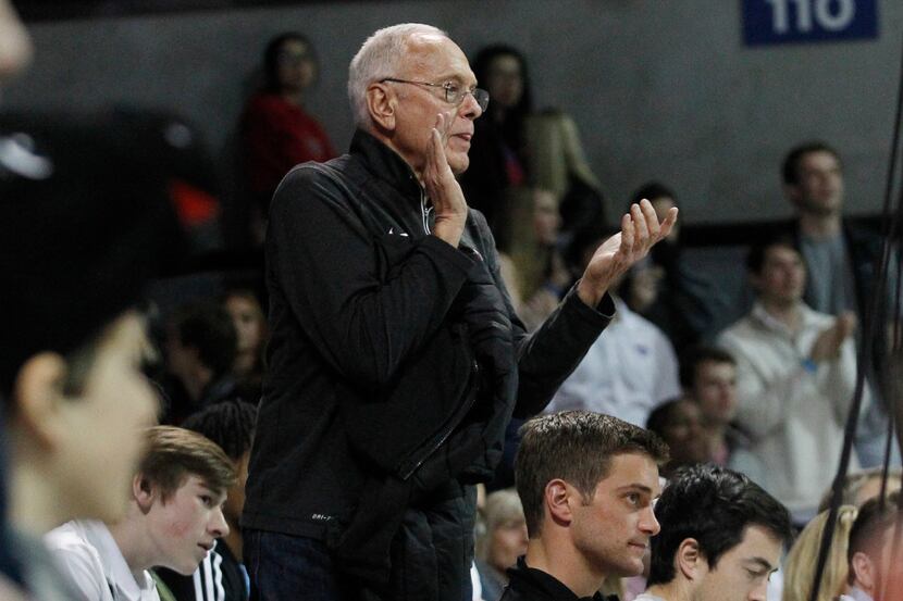 Former SMU coach Larry Brown cheers for the team during the second half of an NCAA college...