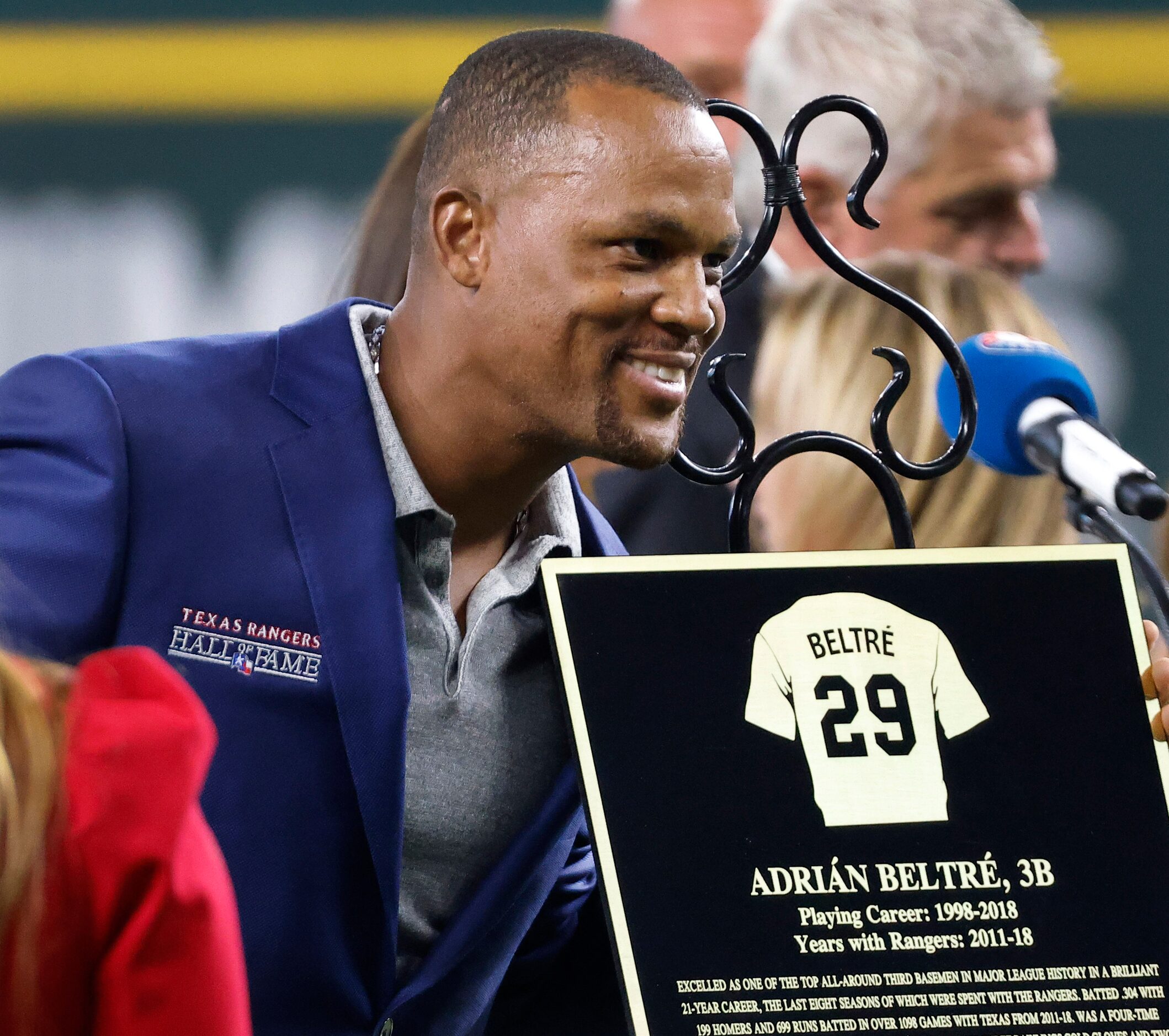 Former Texas Rangers third baseman Adrian Beltre leans in to have a photo made with his...