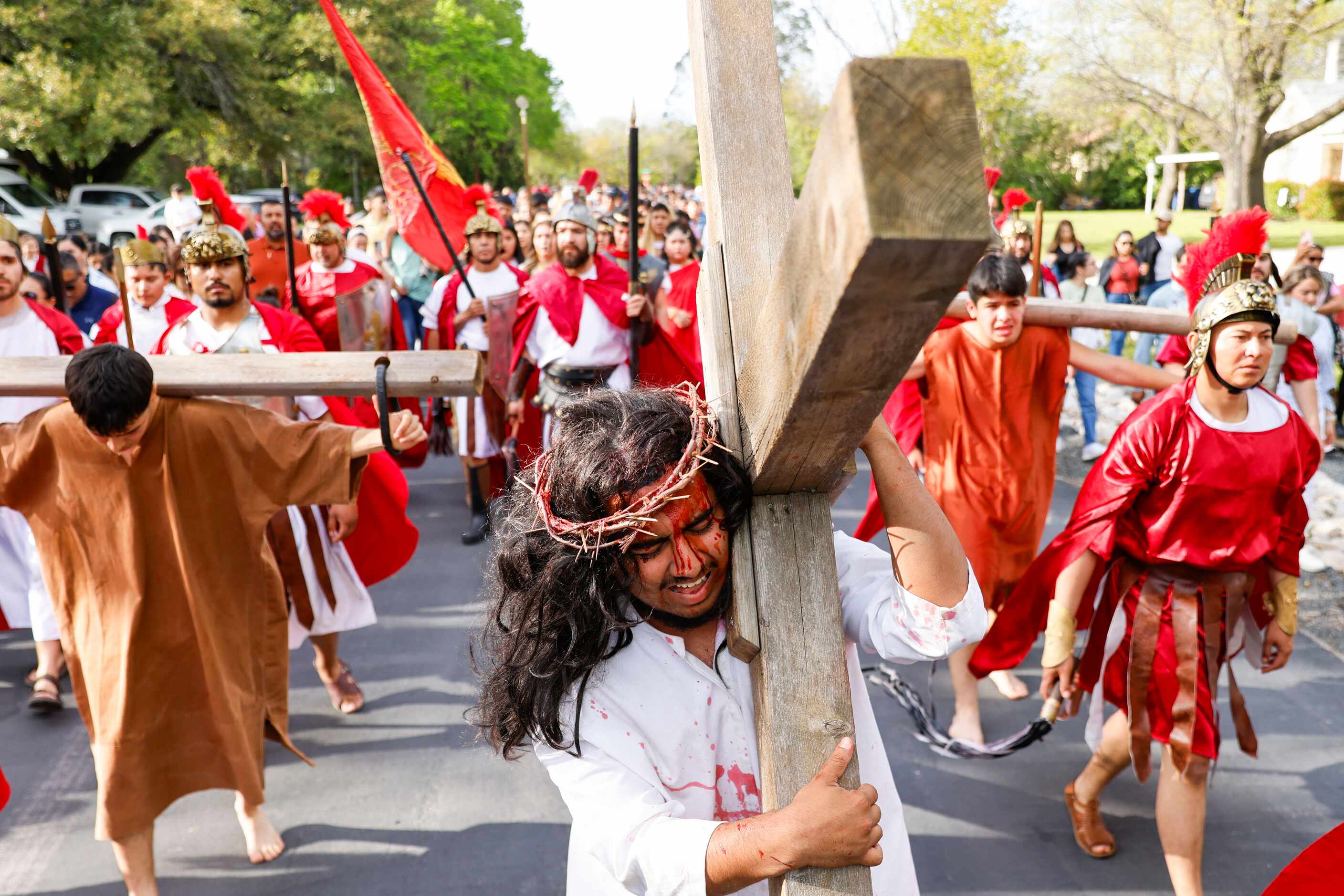 Bernie Gonzalez reenact the sufferings of Jesus Christ during Living Stations of the Cross...