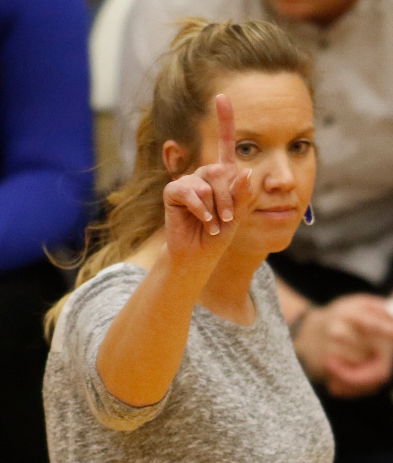 Denton Guyer head coach Heather Van Noy sends in a play during the 3rd game of their match...