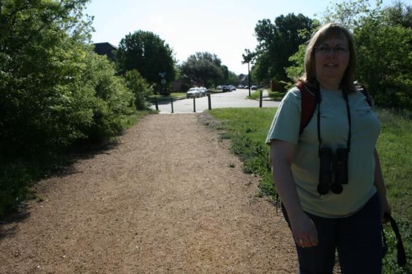 Donna Cole begins a nature walk where Shoreline Trail connects with her neighborhood in The...