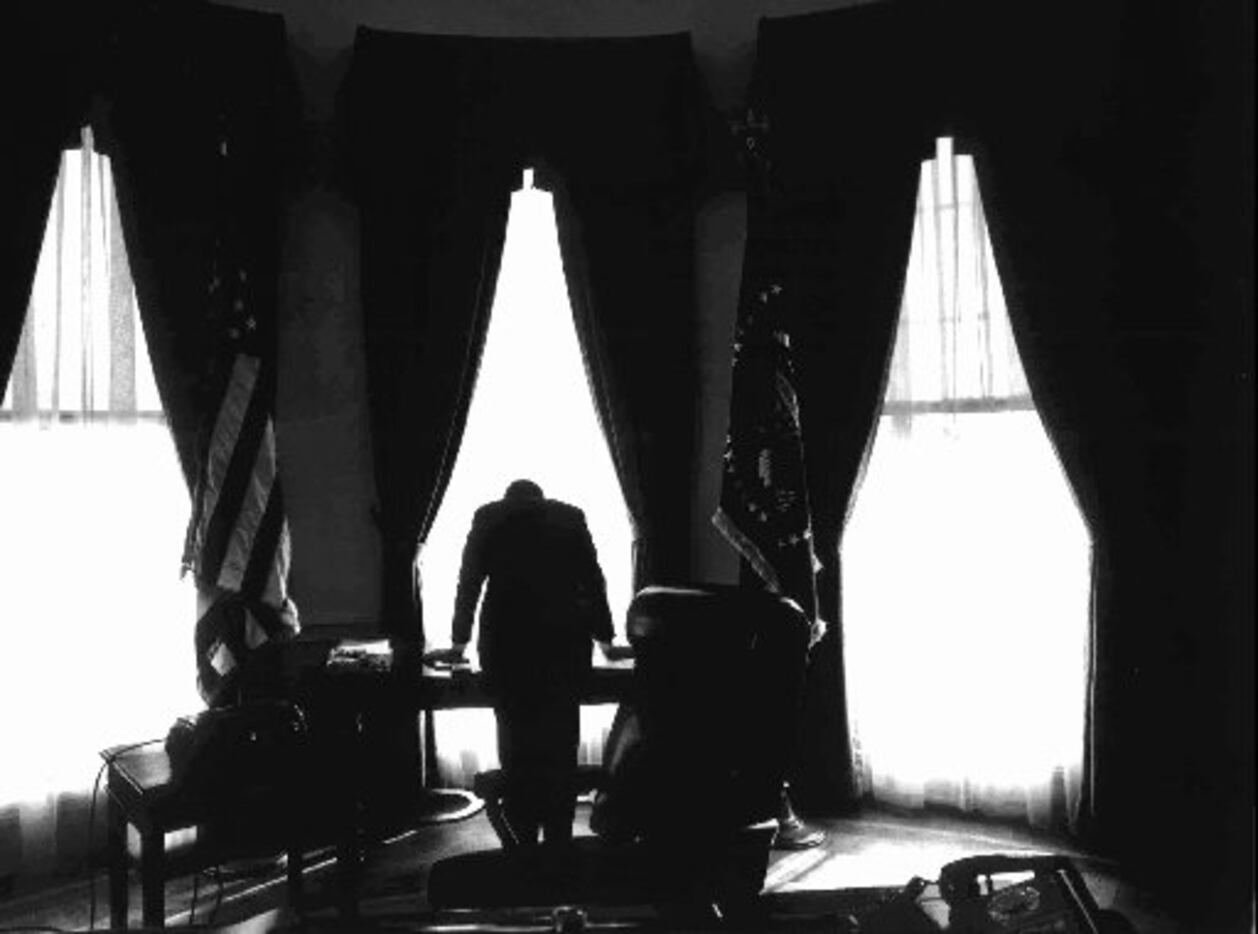 This silhouette of President Kennedy leaning on his desk  was one of the best known...