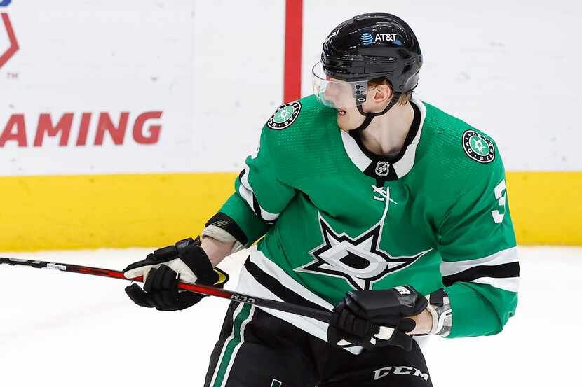 Dallas Stars defenseman John Klingberg (3) tries to get stick on a loose puck in the second...